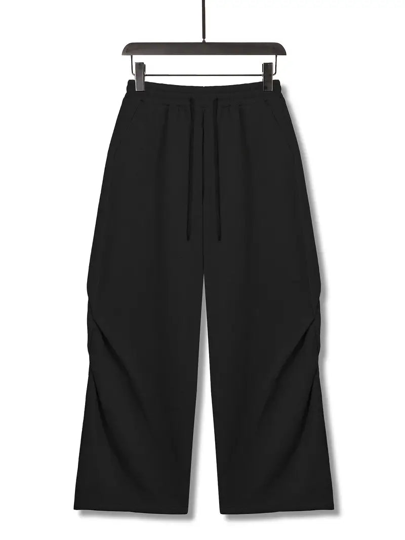 OFF TRACK ESSENTIAL – 8" Baggy Tech Joggers "Schwarz"